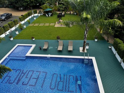 an overhead view of a swimming pool in a resort at The New Njiro Legacy in Arusha