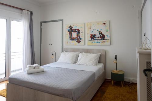 Postel nebo postele na pokoji v ubytování Acropolis View 4-BD Central Apartment