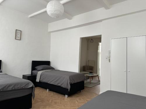 Lova arba lovos apgyvendinimo įstaigoje Cosy Antwerp Apartment (4p)