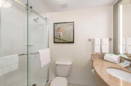a bathroom with a shower and a toilet and a sink at Hilton Garden Inn Scottsdale North/Perimeter Center in Scottsdale