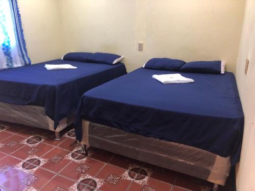 Hostal Sanjuaneritaにあるベッド