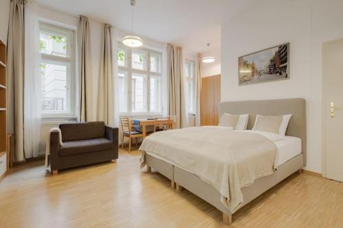 Posteľ alebo postele v izbe v ubytovaní Deluxe suite in prime location
