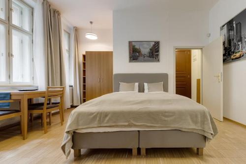 Posteľ alebo postele v izbe v ubytovaní Deluxe suite in prime location