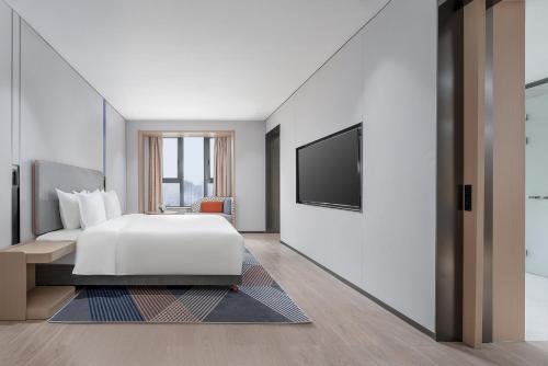 Katil atau katil-katil dalam bilik di Holiday Inn Express Changsha Yuhua by IHG