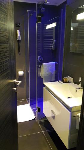 Un baño de Apartments M Palace