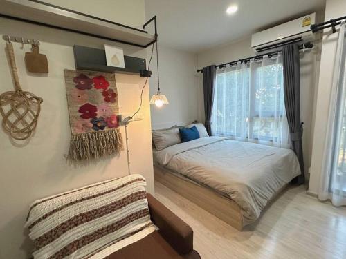 Postel nebo postele na pokoji v ubytování Cozy,convenient,shopping area