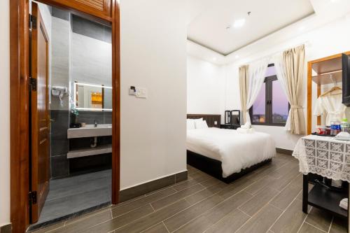 Postel nebo postele na pokoji v ubytování Olagi Hotel 2