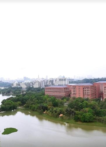 an aerial view of a city and a lake at Homestay King Putrajaya sebelah Alamanda in Putrajaya