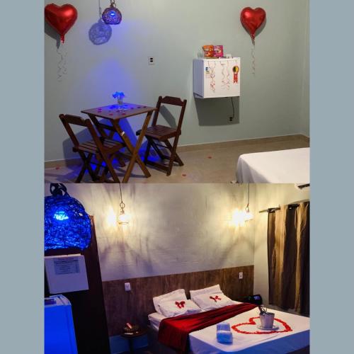 Zimmer mit einem Bett und einem Tisch mit Herzen an der Wand in der Unterkunft Rota 69 Motel & Pousada in Porto Nacional
