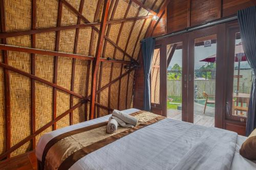 Кровать или кровати в номере Cabana Bali Villa