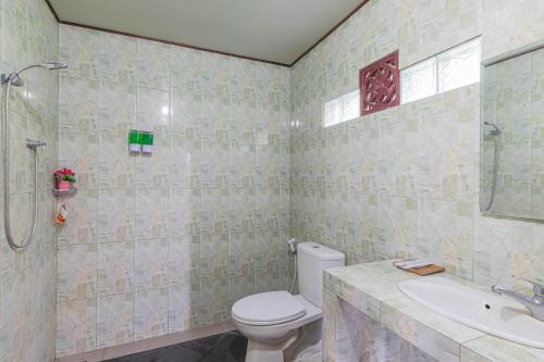 Ванная комната в Cabana Bali Villa