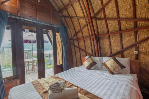 Кровать или кровати в номере Cabana Bali Villa
