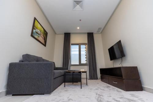 Saray Hotel Apartmentsにあるテレビまたはエンターテインメントセンター