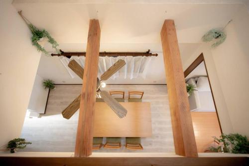 Ένα ή περισσότερα κρεβάτια σε δωμάτιο στο Guest House UMEDA