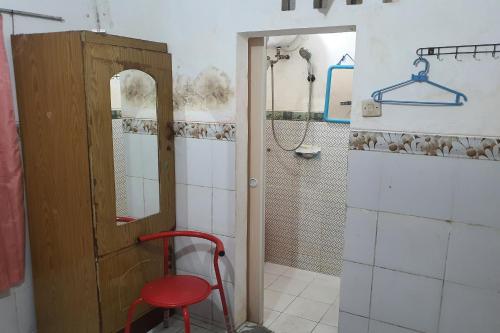 Et badeværelse på OYO 93862 Abang Homestay Syariah