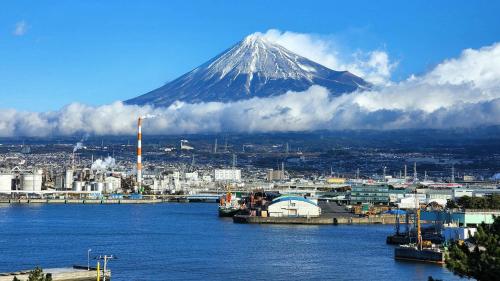 a mountain in the distance with a body of water at Toyoko Inn Shin-fuji-eki Minami-guchi in Fuji