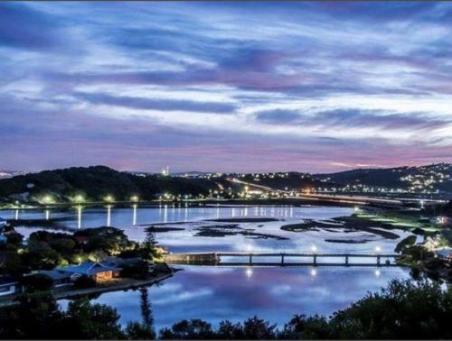 a view of a river at night at Tonquani - Knysna (est. 2022) in Knysna