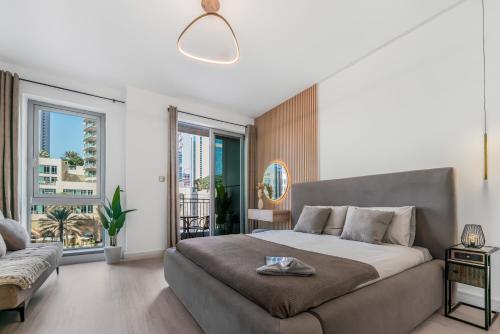 Ένα ή περισσότερα κρεβάτια σε δωμάτιο στο Luxueux Studio, Top emplacement