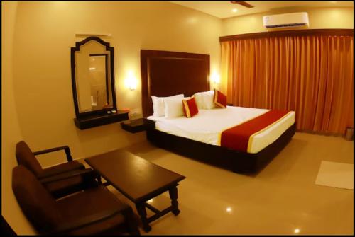 Hotel Sri Deviにあるベッド