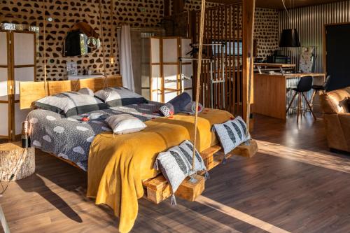 Voodi või voodid majutusasutuse Au Calme Absolu chez Elodie & Aurélien toas