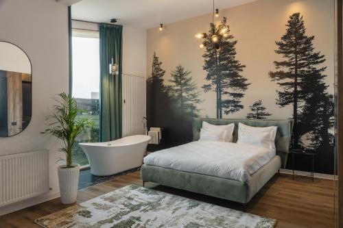 Un pat sau paturi într-o cameră la Green Resort Bran