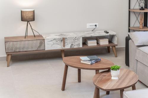 a living room with a couch and a table at Ariadne's House in Sami