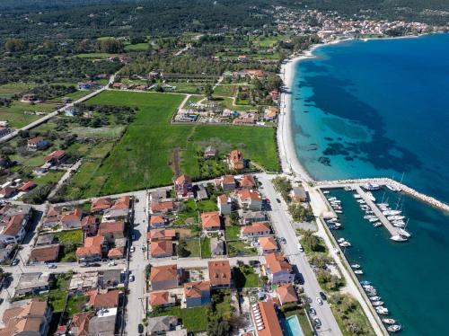an aerial view of a town next to the ocean at Ariadne's House in Sami