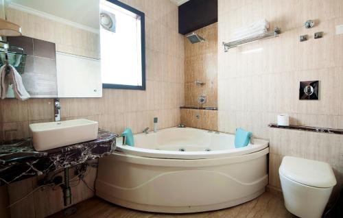 Phòng tắm tại Hotel Le Cadre
