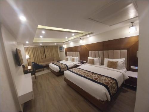 Postel nebo postele na pokoji v ubytování Effotel By Sayaji Dehradun