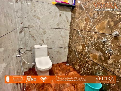 Ένα μπάνιο στο Vedika Yatri Grah - Entire Apartment
