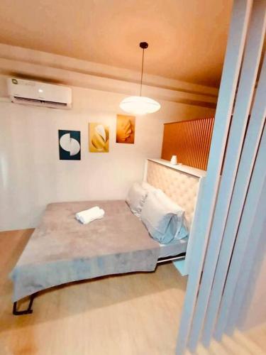 a bedroom with a bed in a room at Serenity in Style: Scandinavian Zen in Nuvali in Pitland