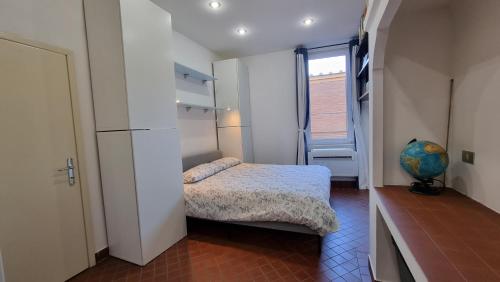 Ένα ή περισσότερα κρεβάτια σε δωμάτιο στο La casa di Bea