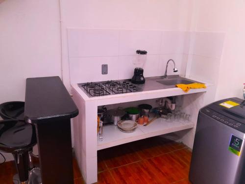 Kuchyň nebo kuchyňský kout v ubytování Apartamento Encanto