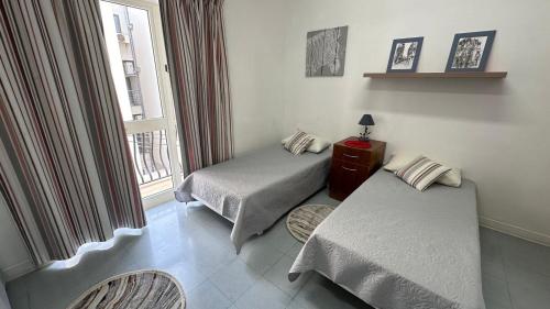 Postel nebo postele na pokoji v ubytování Malta Crown guesthouse