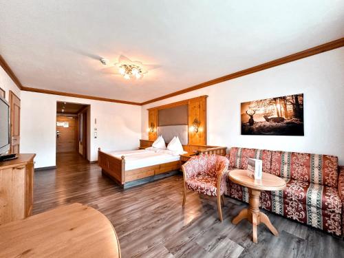 Postel nebo postele na pokoji v ubytování Hotel Das Urbisgut