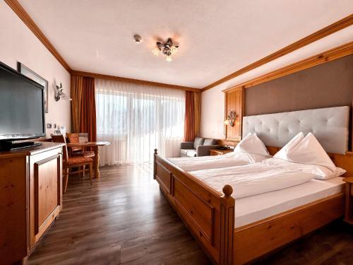 Postel nebo postele na pokoji v ubytování Hotel Das Urbisgut
