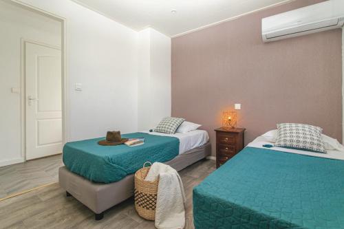 Ένα ή περισσότερα κρεβάτια σε δωμάτιο στο Villa Vista Mare 33 Favone 6P superbe vue mer plage Favone 600M