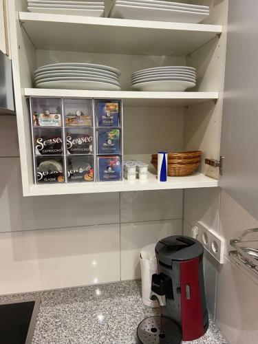 Una cocina o cocineta en ALB 74