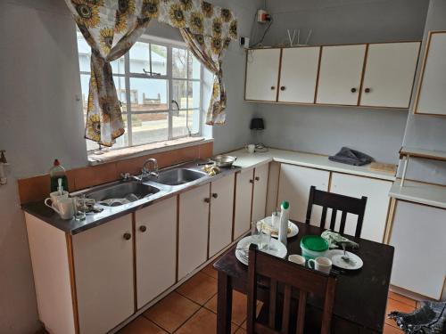 Köök või kööginurk majutusasutuses Courageous Self Catering Accommodation
