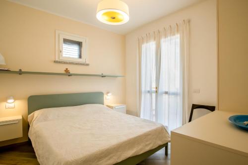 Postel nebo postele na pokoji v ubytování Casa Sestini