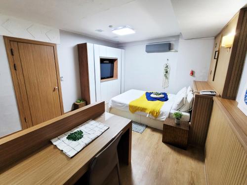 Postel nebo postele na pokoji v ubytování Residence Yeoyu