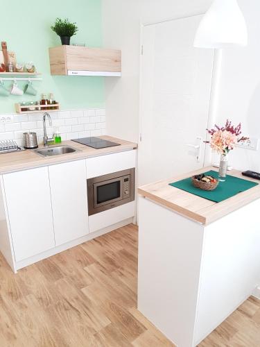 Cuisine ou kitchenette dans l'établissement VeryBell