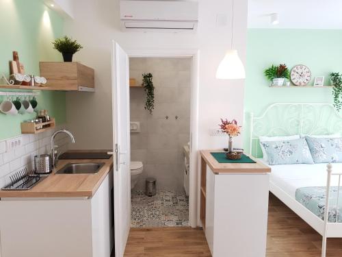 Cuisine ou kitchenette dans l'établissement VeryBell