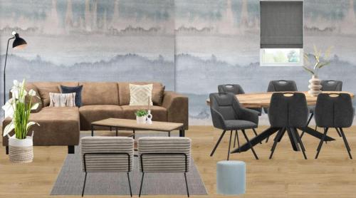 a living room with a couch and a table and chairs at Vakantiepark Hertenhorst in Beekbergen