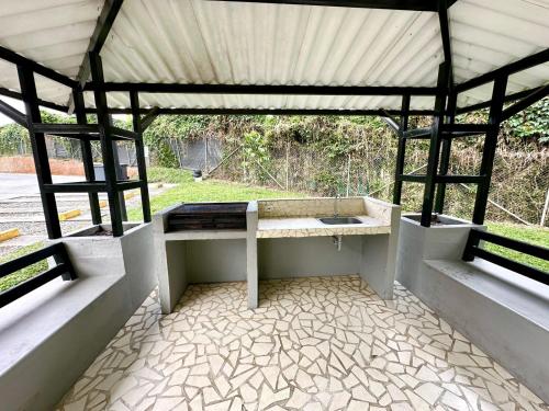 a pavilion with a sink in the middle of it at Apartamento 205 torre C Reserva de la Colina La Tebaida Quindio in La Tebaida