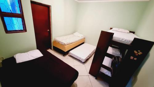 Postel nebo postele na pokoji v ubytování Casa Confortável em Sumaré divisa Paulínia e Rod Anhanguera