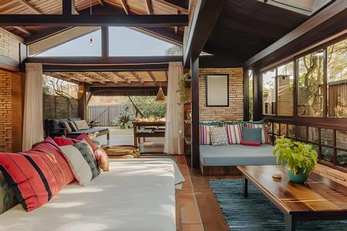a living room with a couch and a table at Casa Thai Linda na Praia in Barra de Ibiraquera