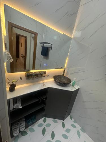 a bathroom with a sink and a mirror at Ray guesthouse in Ulaanbaatar