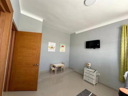 TV a/nebo společenská místnost v ubytování Casa Medrano