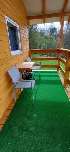Un balcón o terraza en Modrzewie